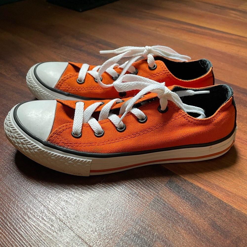 Orange and black size 2 Converse Chuck Taylors